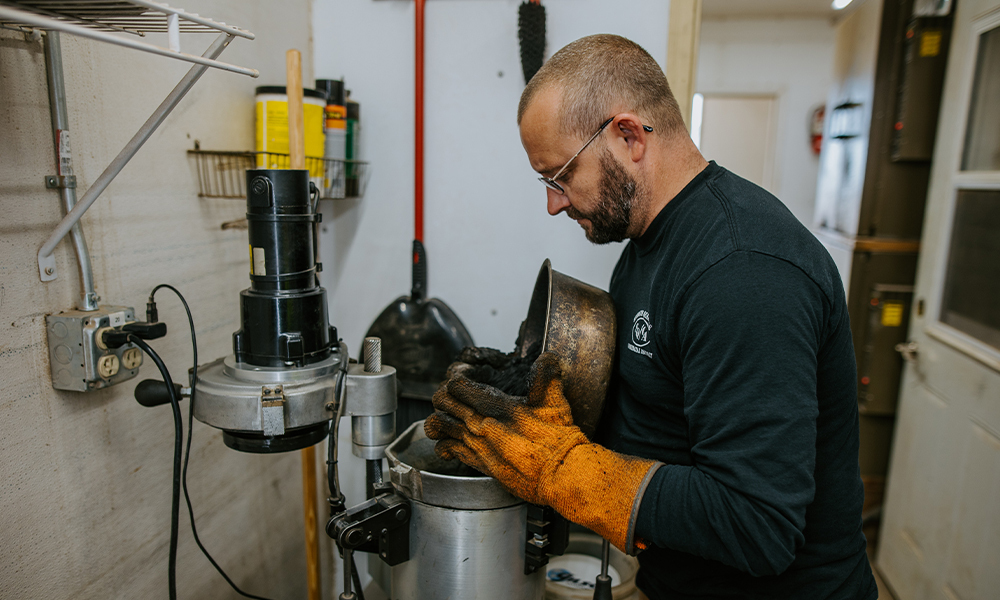 A commercial asphalt team members prepares materials